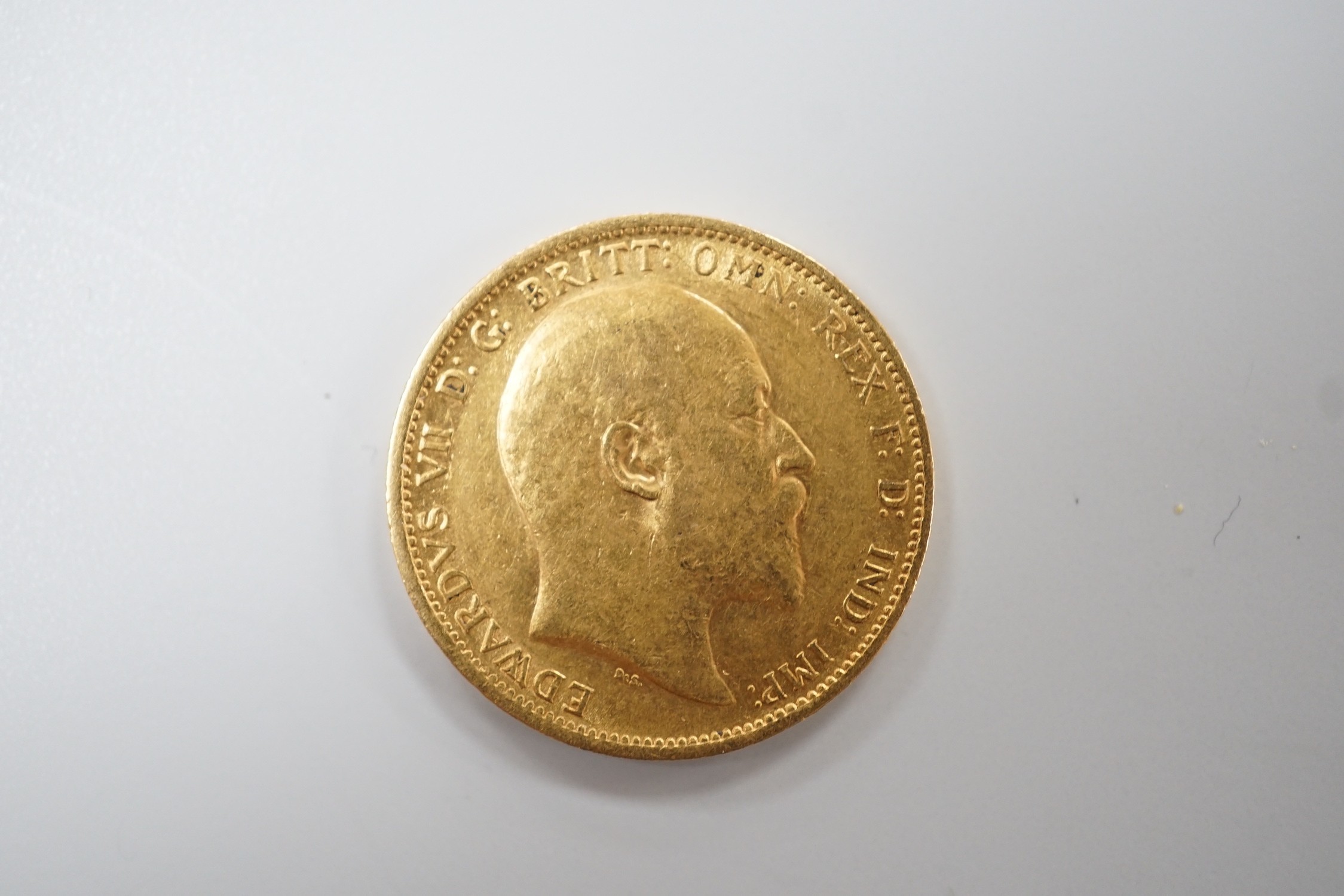 An Edward VII 1906S gold sovereign.